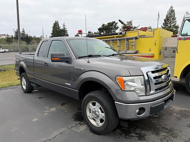 2011 Ford F-150 4WD Base in Grey — front three-quarter view